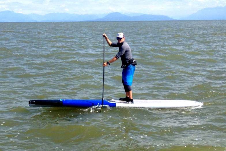 North West waves are starting to kick up on stand up paddlers