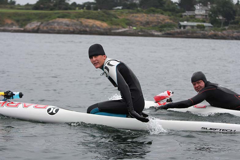 Stand Up For Men’s Health paddle boarders arriving in Victoria Harbour