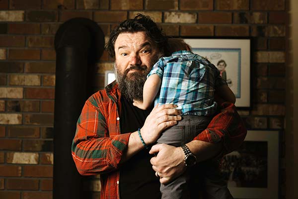 Toby Hargrave carrying his child a micro workout