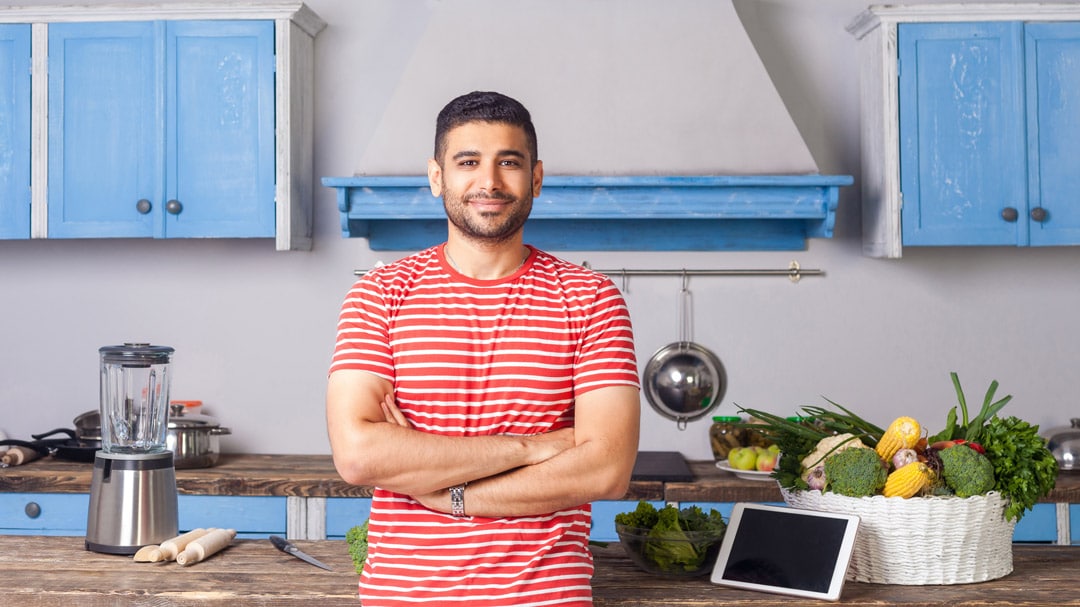 Indian man in kitchen