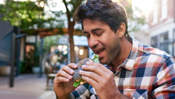 Man eating lunch outside