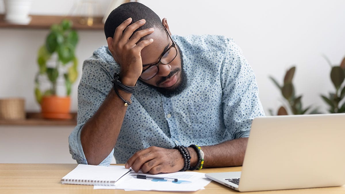 Man feeling financial stress