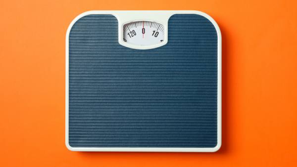 scale with orange background