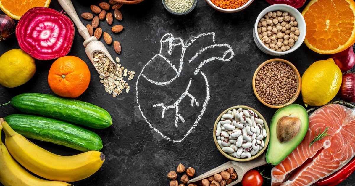vegetables, legumes, salmon, and a heart drawn in chalk