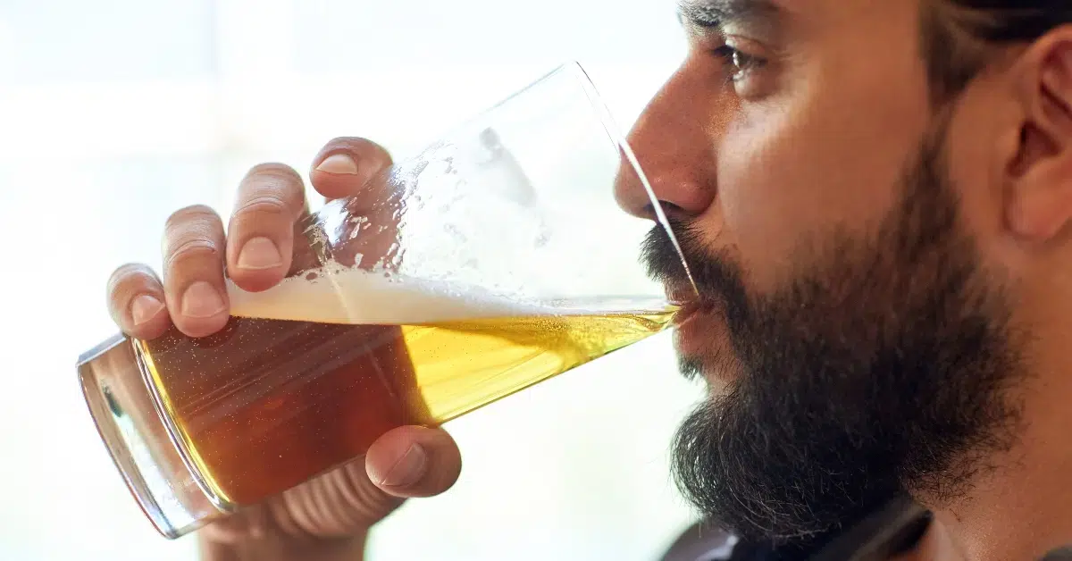 man drinking glass beer.jpg