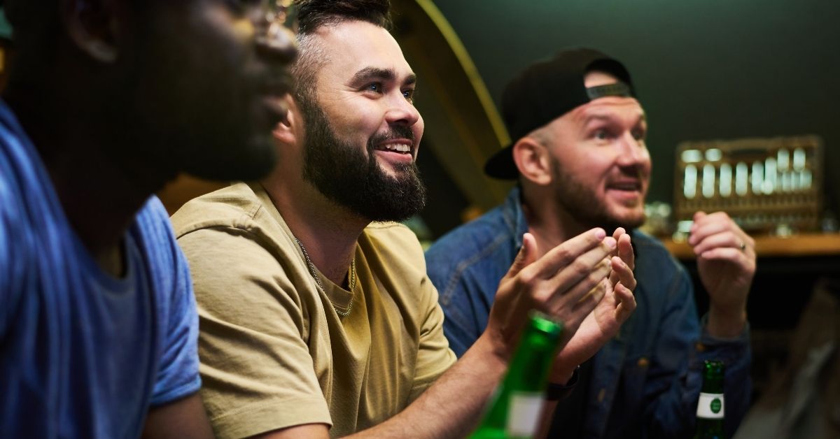 men watching sports in a pub