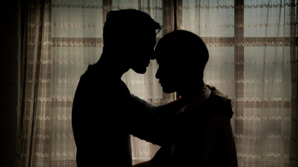 male partners embracing