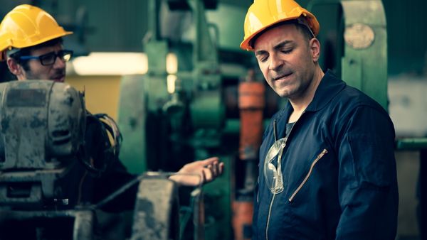 frustrated man in factory