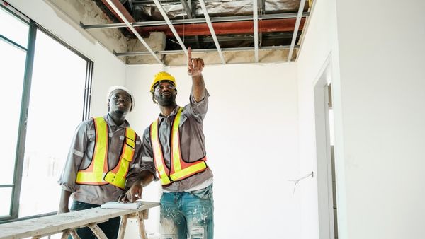 two men working on ceiling 1