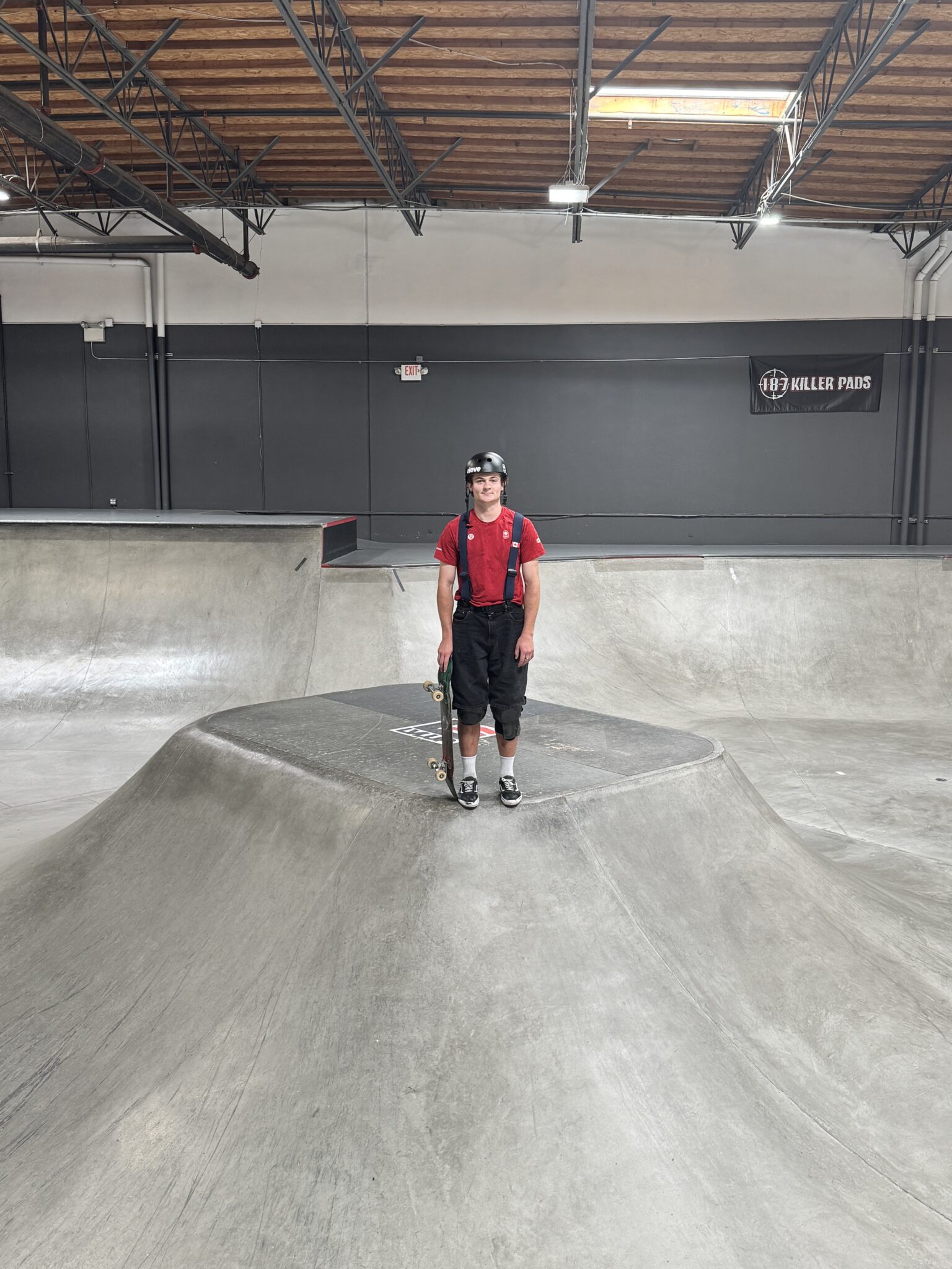 richie bullbrook has suspenders on in a skate park